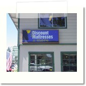 Discount Matresses Backlit Sign